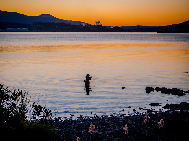 Fishing on the Derwent River at twilight