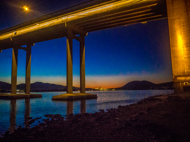 The view north up the River Derwent at Sunset, from under the Tasman Bridge