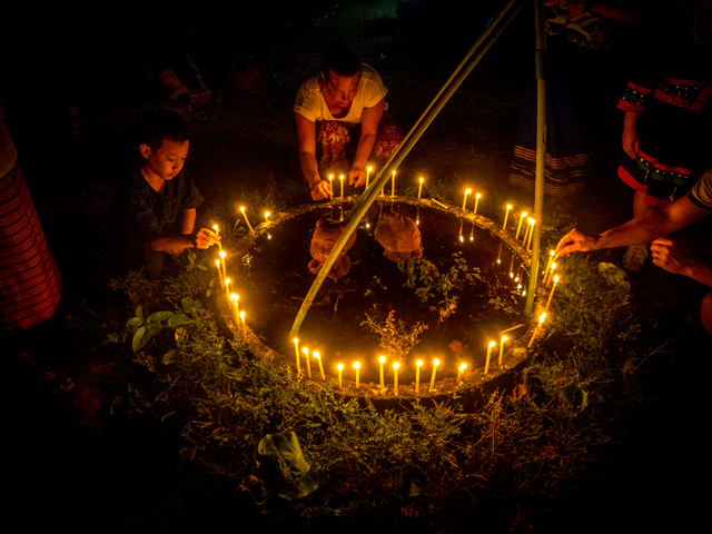 Lighting prayer candles