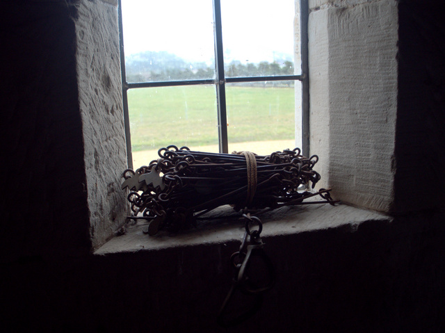 Chains on a window sill in the stables