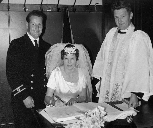 My parents signing the marriage register at Holy Trinity Church in December 1964