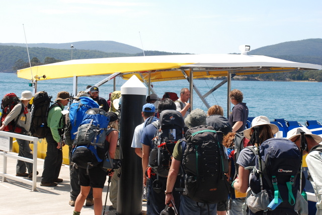 Rob Pennicott welcomes walkers aboard his boat for the Three Capes Track