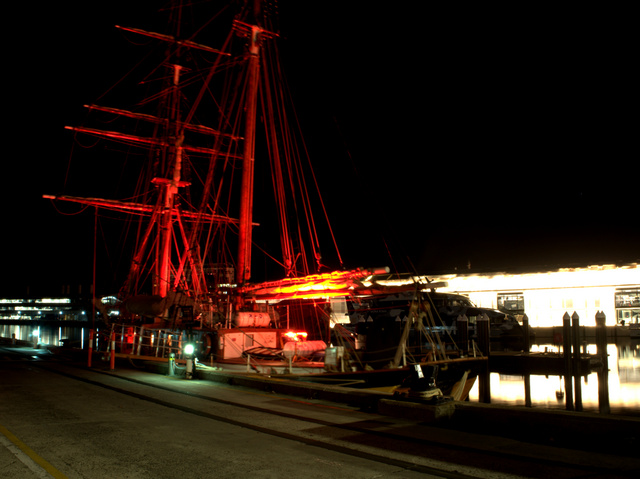 A sailing vessel at Elizabeth Street Pier gets its Dark Mofo vibe on
