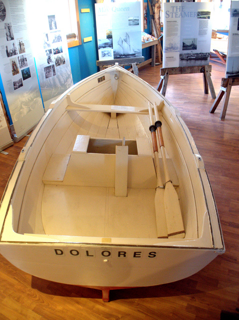 A handcrafted dinghy on display at the Wooden Boat Centre