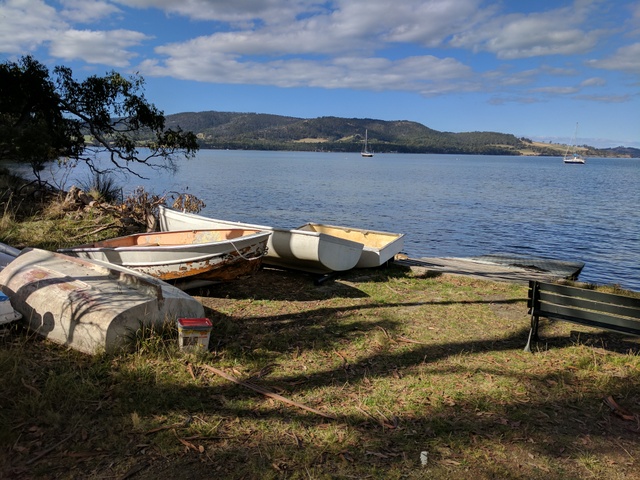 Dinghies on the foreshore along the Dave Burrows walking trail