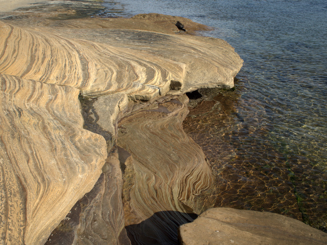 Colours and stratification of the weathered sandstone on the foreshore at Dodges Ferry