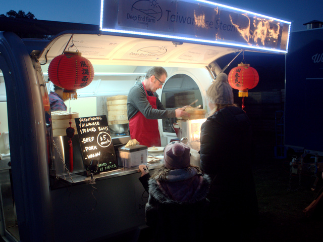 Local food producers and caterers keep the revellers fed and well-watered at the Huon Valley Midwinter Festival