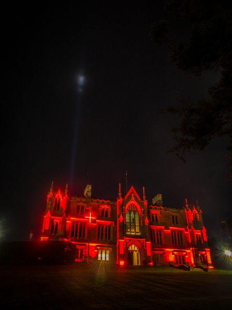 Domain House with Spectra glowing in the distance