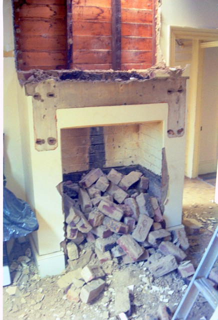 Pulling out the stove and chimney which half-filled the small kitchen was a priority