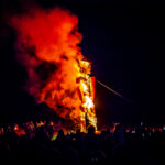 Revellers gather around a firepot at the 2019 Huon Valley Midwinter Festival