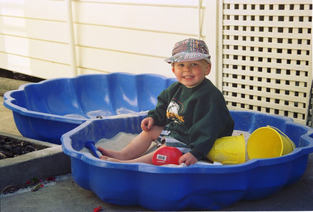 Alex in his new sand pit, Christmas 1994